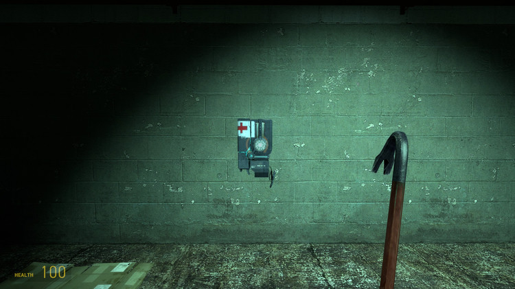 Half-Life 2 screenshot at 16:9, showing a health charger viewed head-on.