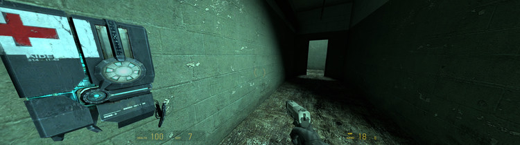 A screenshot of Half-Life 2 at 32:9, with the health charger viewed from an angle, displaying massive distortion.